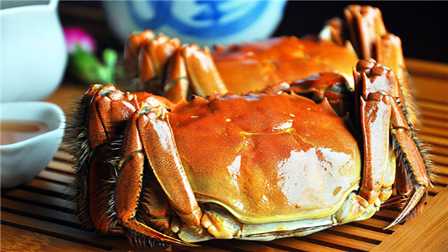哪些食物不可以同螃蟹一起食用？